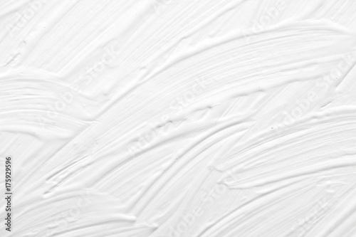 Texture of white color with patterns of divorces and strips painted by paints. Background for a holiday card.