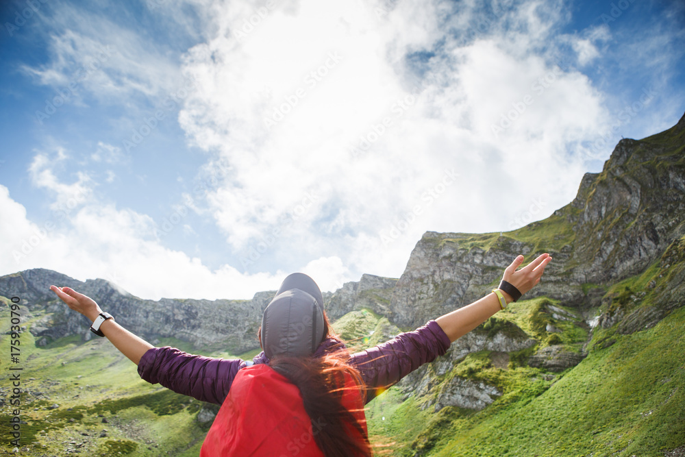 Obraz premium Toned photo of tourist girl with backpack