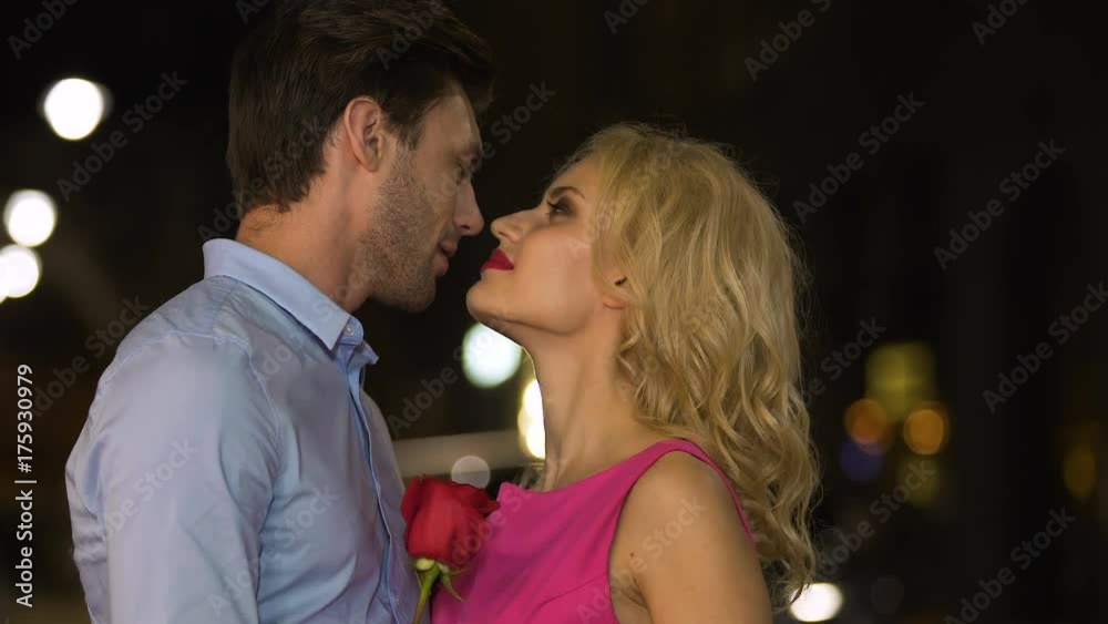 Beautiful blonde looking at her man with eyes full of passion and temptation Beautiful blonde looking at her man with eyes full of passion and temptation