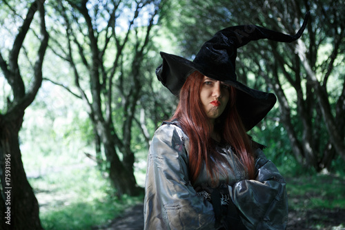 Photo of dissatisfied witch in long black hat
