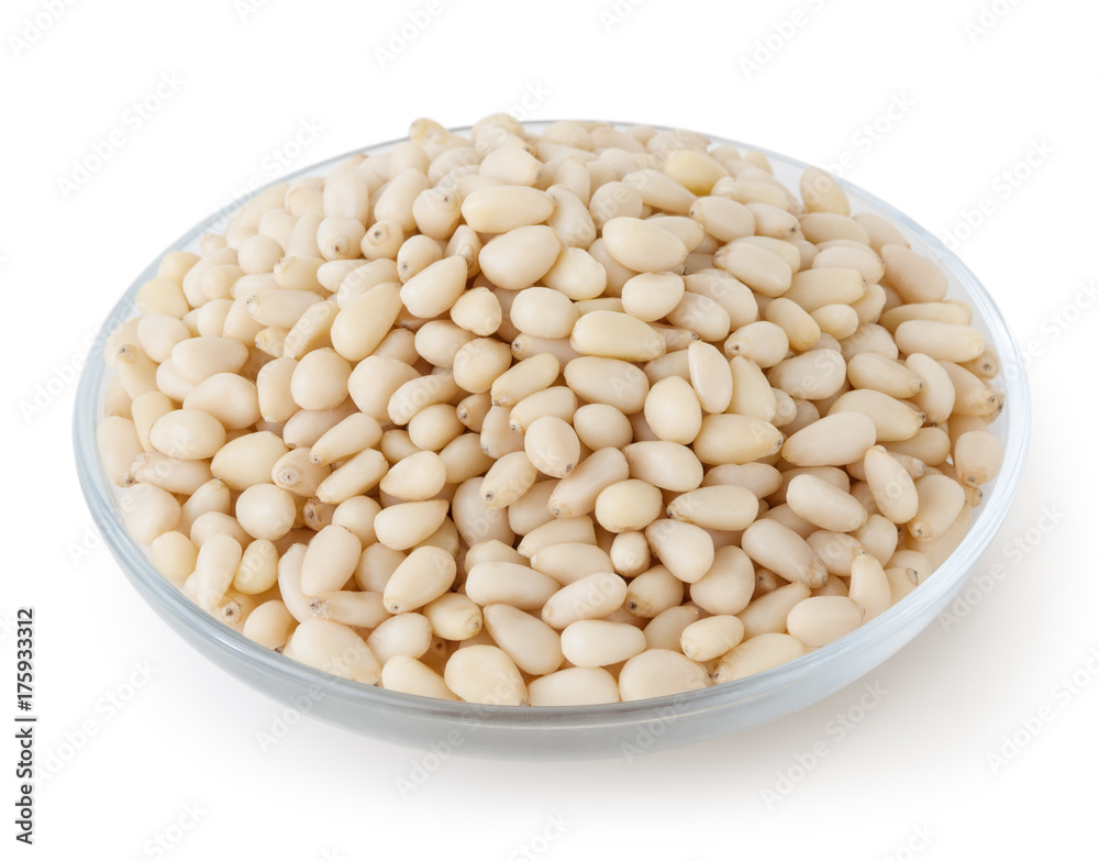 Shelled cedar pine nuts isolated on white background with clipping path Shelled cedar pine nuts isolated on white background with clipping path