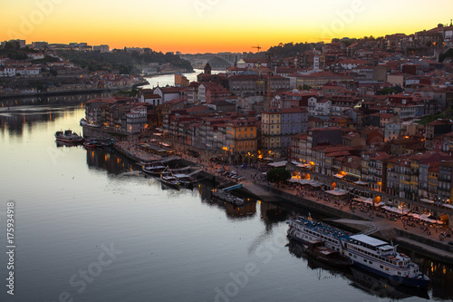 Douro river and Ribeira from Dom Luis I bridge in twilight, Porto, Portugal.