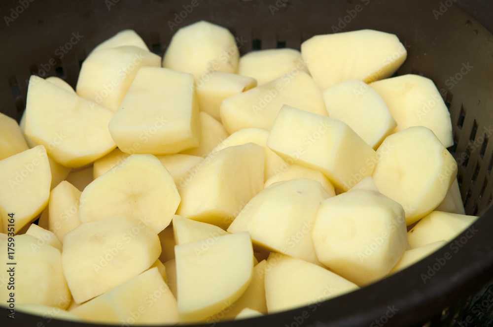 chopped fresh potato to make delicious patats bravas chopped fresh potato to make delicious patats bravas