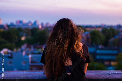 Photography Smoking Woman watching sunset of Amsterdam from rooftop terrace
