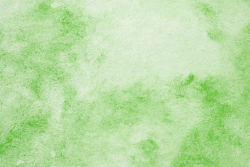 Green abstract watercolor painting textured on white paper background