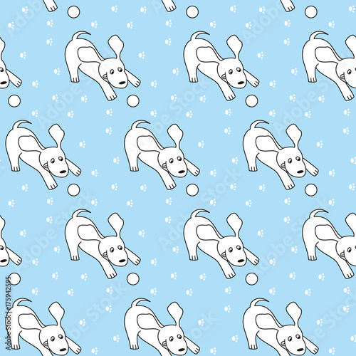 Seamless pattern with cartoon dogs on the blue background. photo