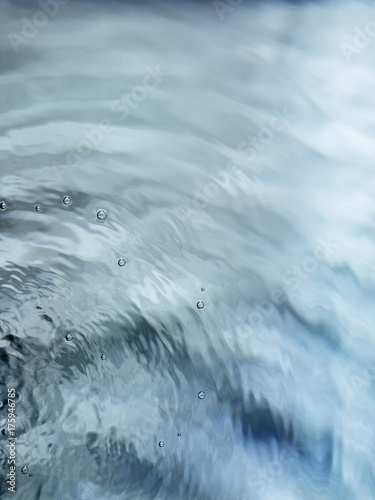 Fotografie Painterly, tranquil, and meditative blue green flowing water background fad to w
