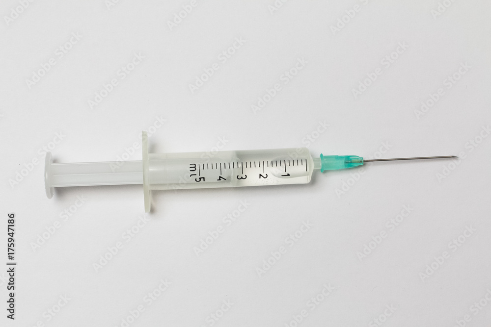 syringe in hand syringe in hand