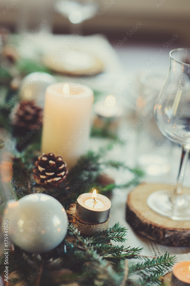 Table setting for celebration Christmas and New Year Holidays. Festive table at home with rustic details
