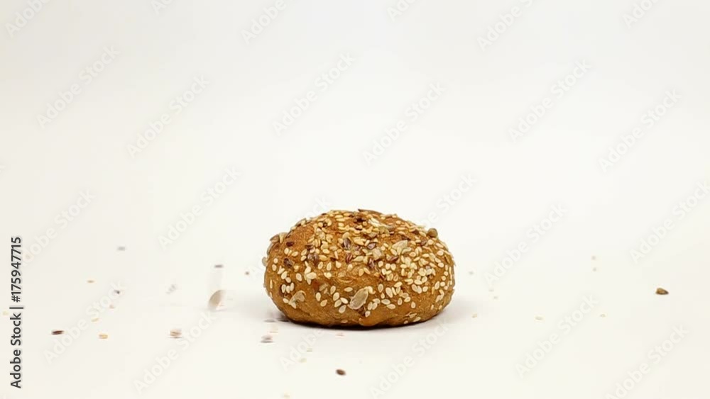 roll with seeds on a white background