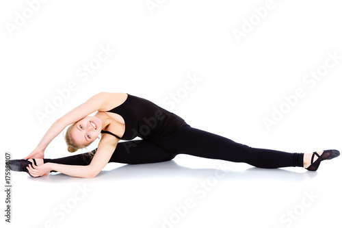 Young happy woman doing fitness exercise, isolated on white background