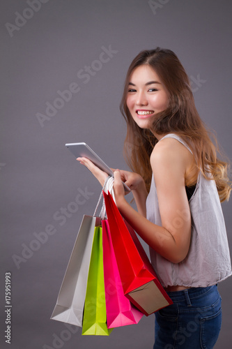 happy woman enjoying online shopping, order placement