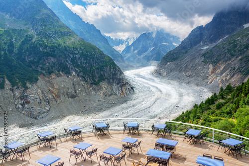 Panoramic cafe terrace with view on glacier Mer de Glace, in Chamonix Mont Blanc Massif, The Alps, France