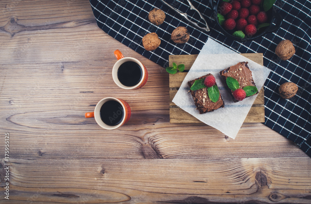 Cup of coffee with homemade brownies. Cup of coffee with homemade brownies.