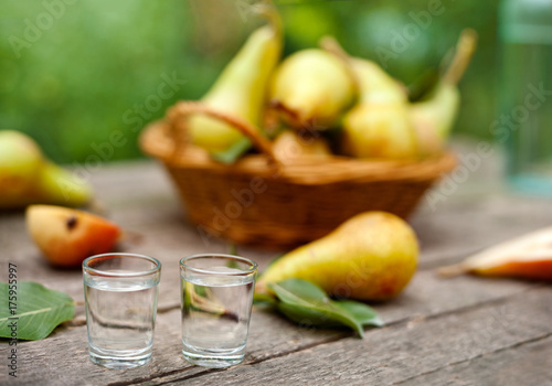 Pear brandy alcohol drink in shot glass