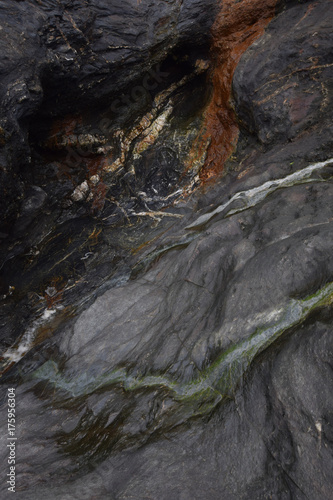 Eroded slate Tregardock Beach Cornwall