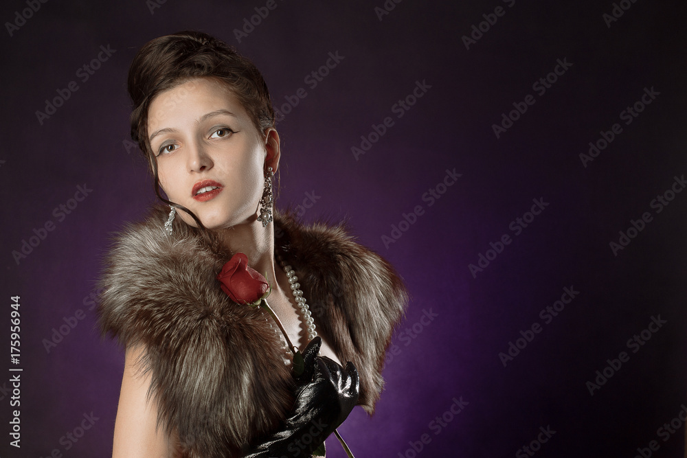 beautiful female retro style portrait with rose on purple background with copy space beautiful female retro style portrait with rose on purple background with copy space