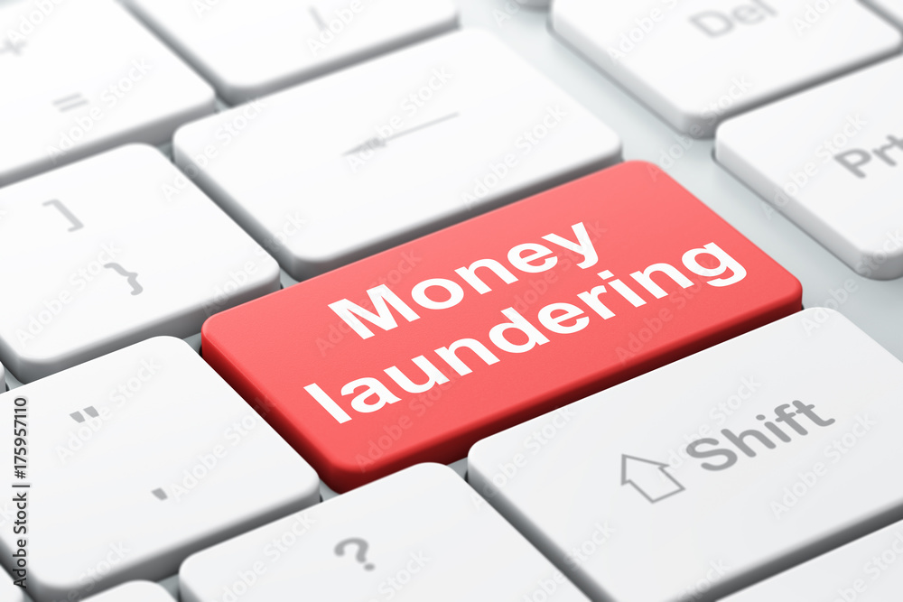 Banking concept: Money Laundering on computer keyboard background Banking concept: Money Laundering on computer keyboard background