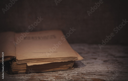 Vintage old book on the old wood