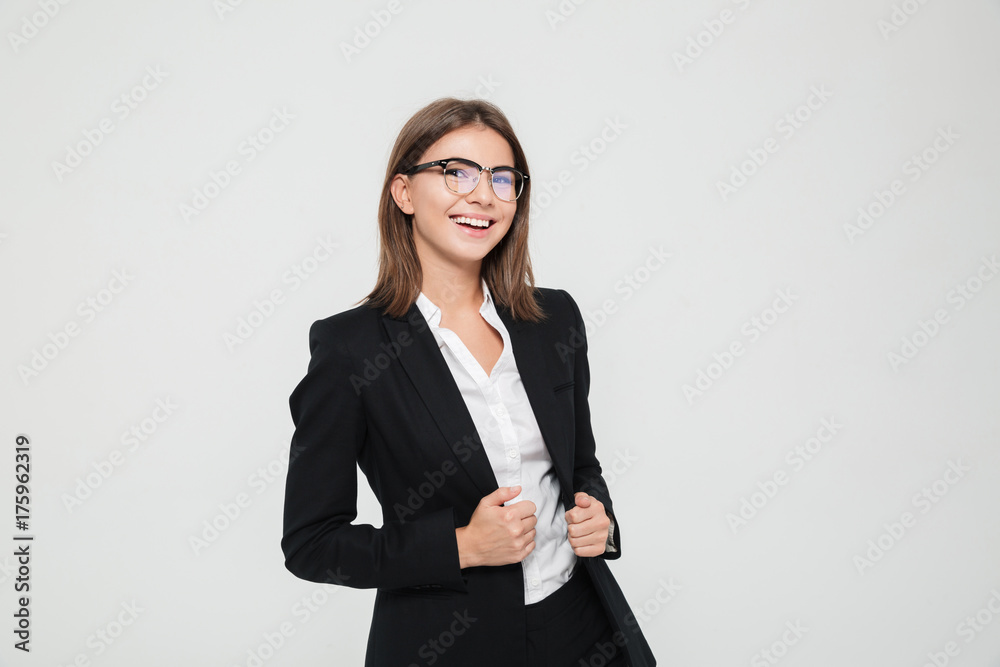 Portrait of successful smiling businesswoman in suit Portrait of successful smiling businesswoman in suit