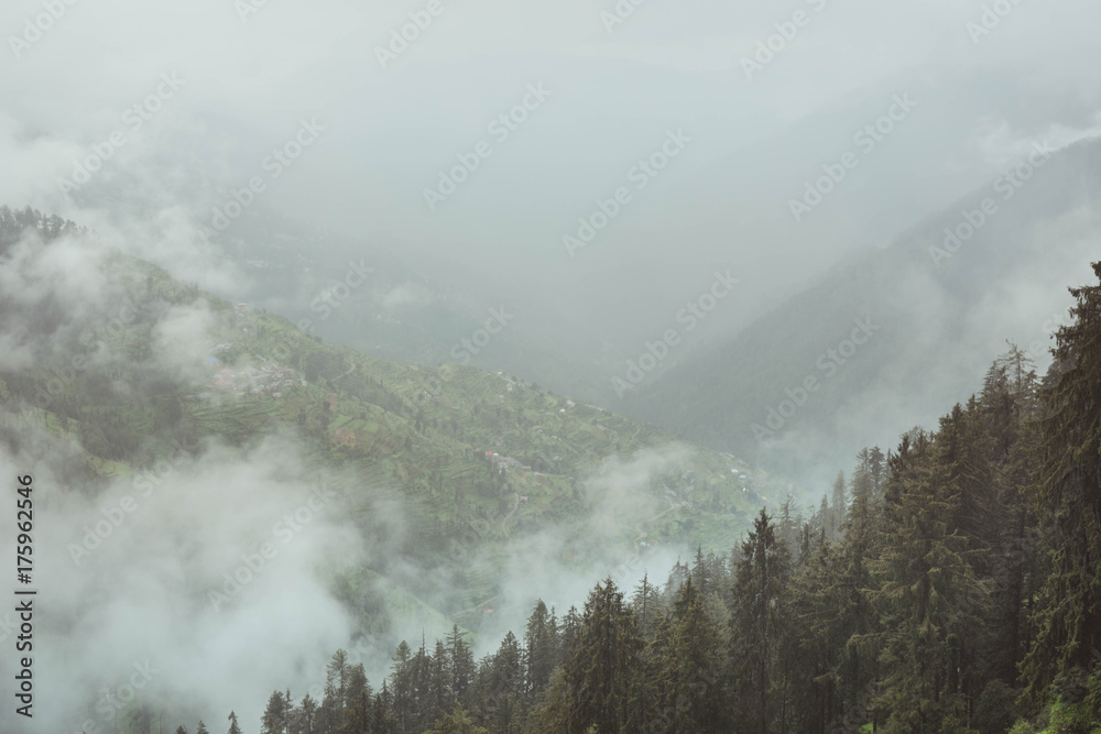 Himalayas mountains fog landscape.