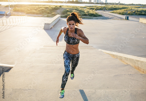 Woman doing a full intensity stair run