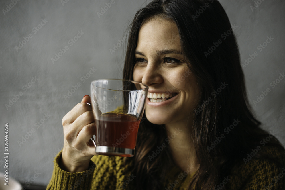 Woman drinking cup of tea Woman drinking cup of tea