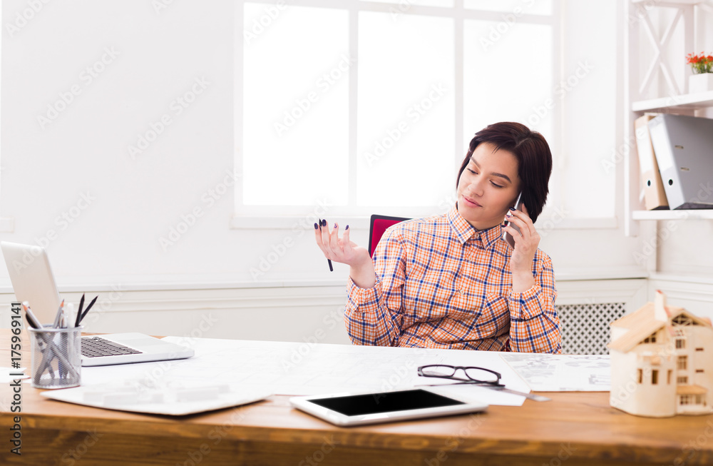 Business woman reading document at office desktop Business woman reading document at office desktop