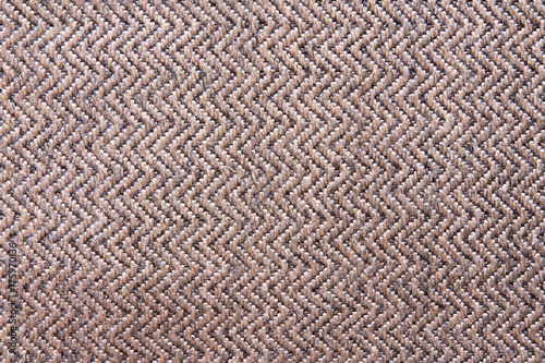 Texture of natural linen fabric in pattern brown color close-up in vintage style