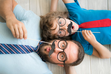 Happy family playing in home