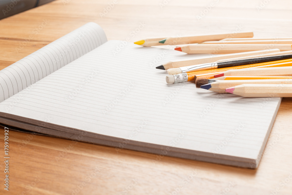 Notebook and pencils Notebook and pencils