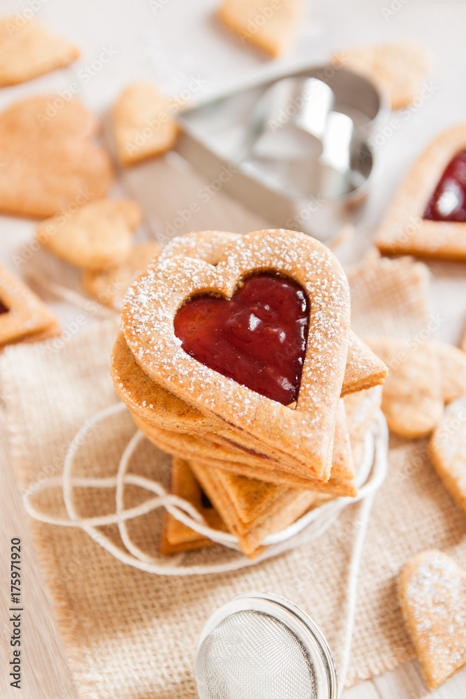 Heart shaped biscuits with strawberry jam Heart shaped biscuits with strawberry jam