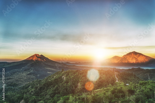 Active volcano Mount Gunung Batur at sunrise in Bali, Indonesia. photo