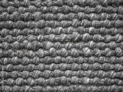 Close up of a wool carpet. Black and White texture. Modern design.