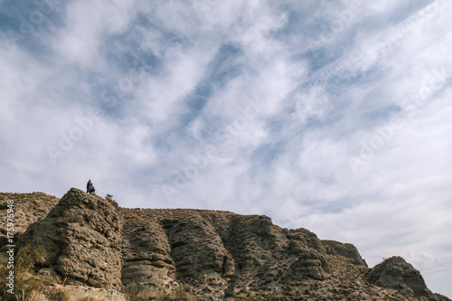 Mid Adult Couple in a Desertic Landscape