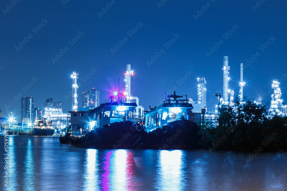 The lights from ship and Oil refinery with beautiful in night Bangkok