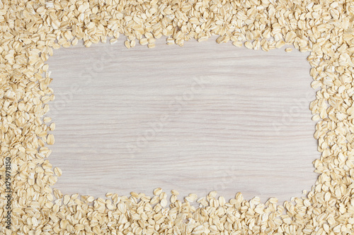 Frame of oat flakes photo