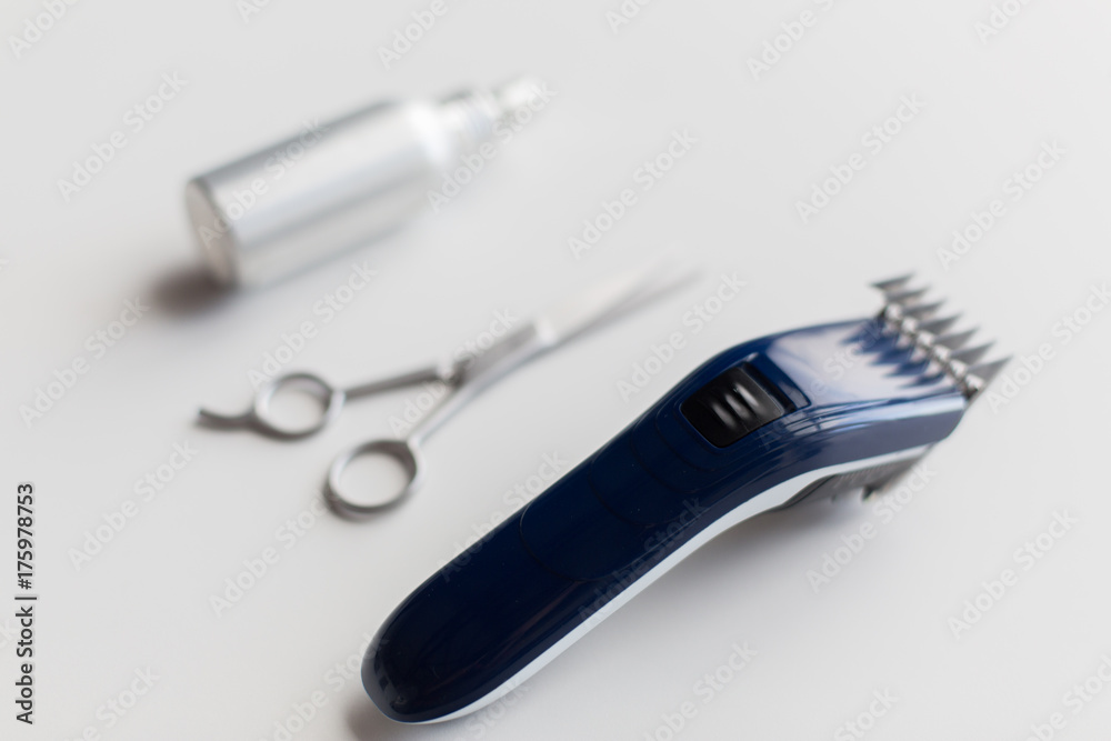 styling hair spray, trimmer and scissors styling hair spray, trimmer and scissors