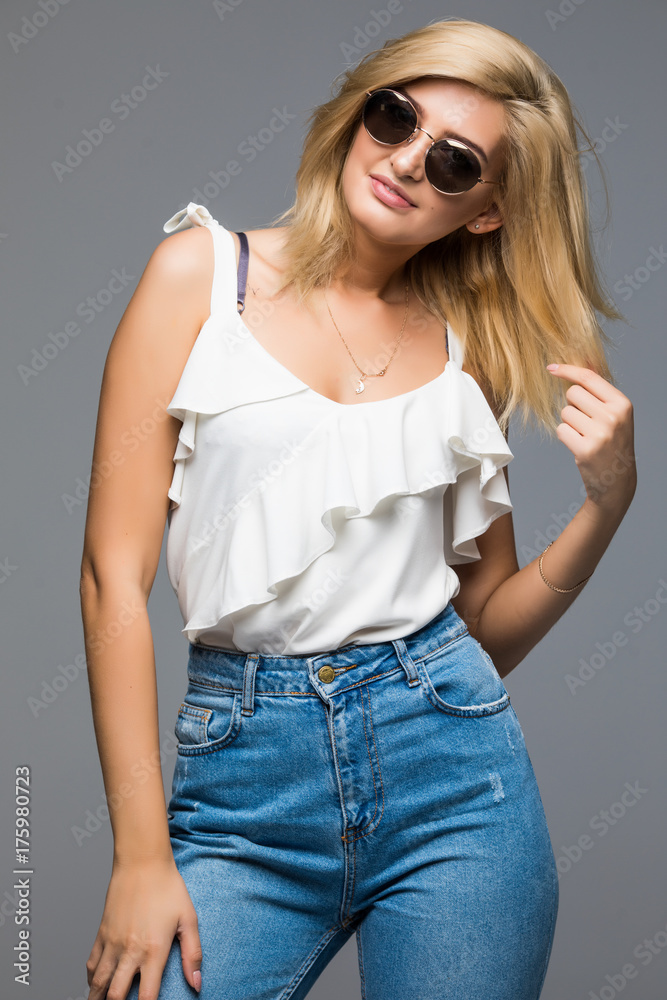 high fashion portrait of young elegant woman on gray Studio shot high fashion portrait of young elegant woman on gray Studio shot