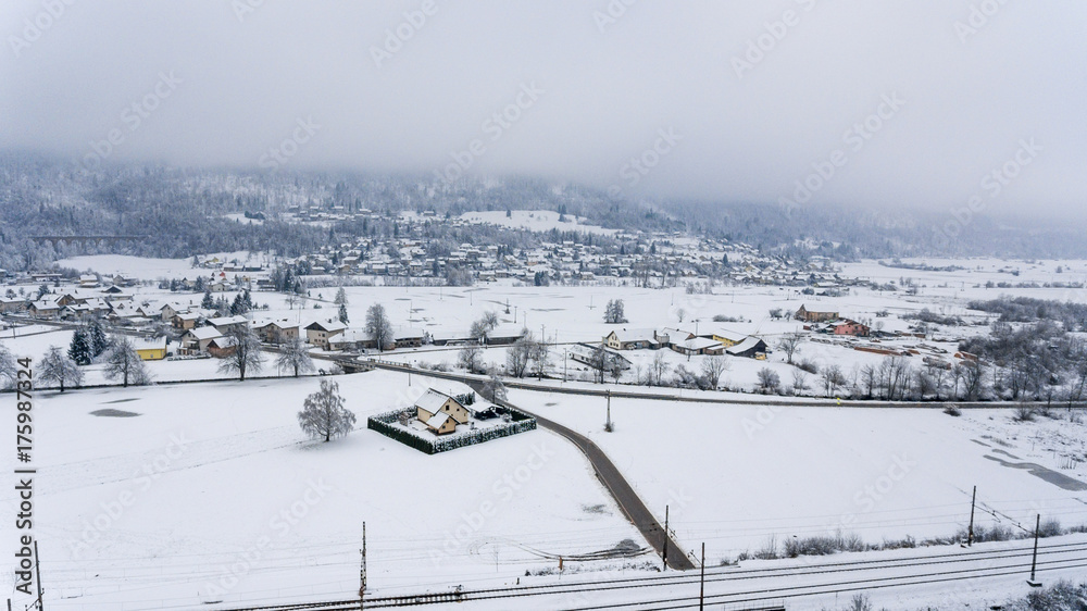 Aerial view of snow covered town.