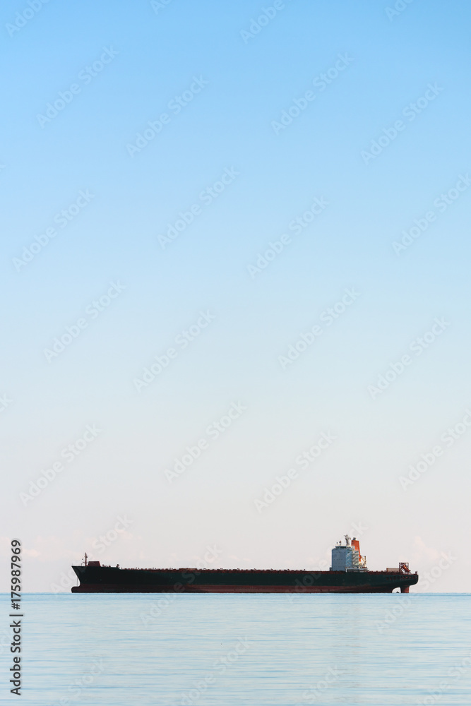Oil tanker ship in the morning light Oil tanker ship in the morning light