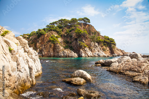 Fotografie Blue lagoon at the foot of the castle hill of Tossa de Mar, Spain