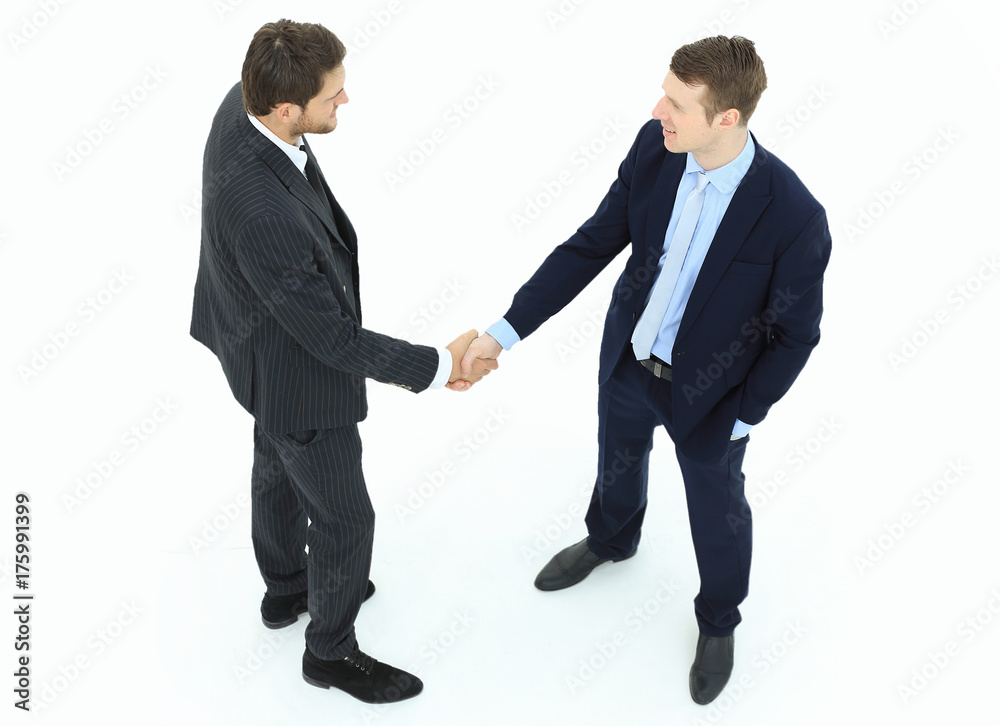 in full growth.handshake, business partners ,isolated on white background. in full growth.handshake, business partners ,isolated on white background.