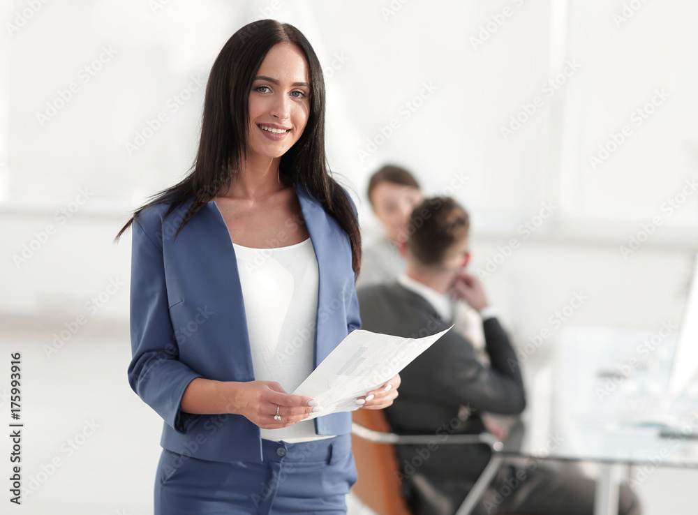 Beautiful woman on the background of business people Beautiful woman on the background of business people