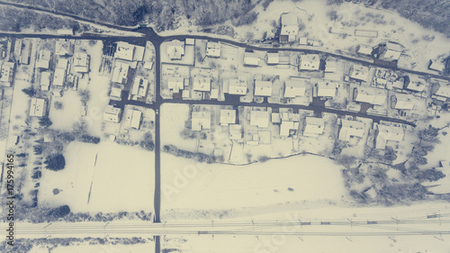 Top view of snow covered buildings.