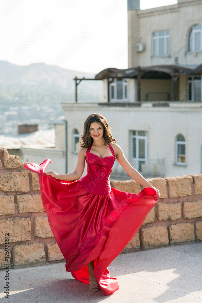 Beautiful woman in a red dress