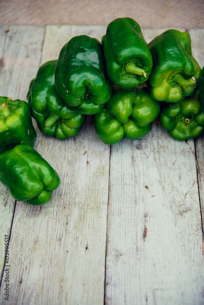 Green peppers on table. Green peppers on table.