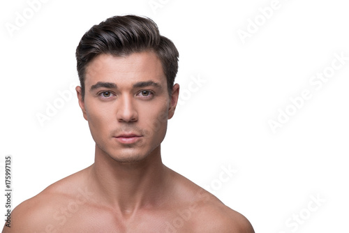 Attractive youthful male is expressing confidence