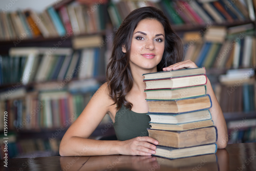 young woman in a library young woman in a library
