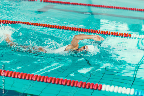 Female swimmer on training in the swimming pool